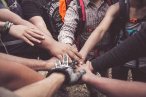 Volunteers Doing Group Hand Cheer